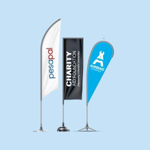 Custom printed teardrop, feather, and rectangular promotional banners on display stands by Jambas Imaging in Kampala, Uganda.